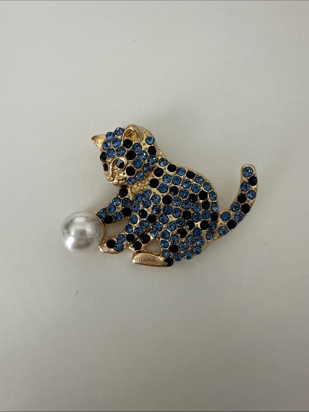 Gold Cat Brooch with Blue Crystals and Pearl Accent